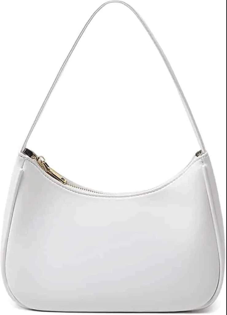 White crescent shoulder bag with a thin strap and a gold zipper