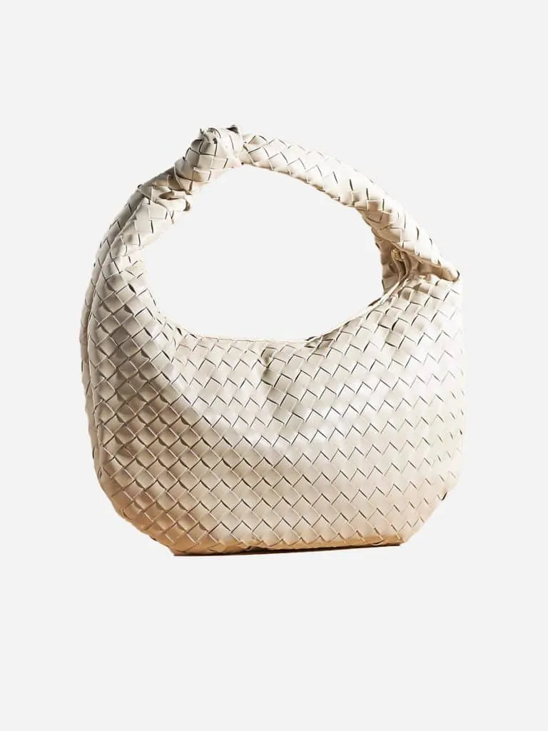 Anthropologie Brigitte Satchel, a slouchy cream woven shoulder bag with a knotted handle
