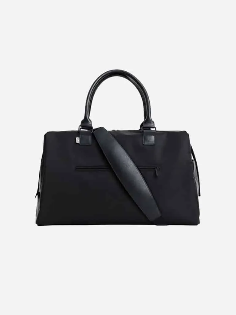 BEIS The Commuter Duffle in black with top handles and a shoulder strap
