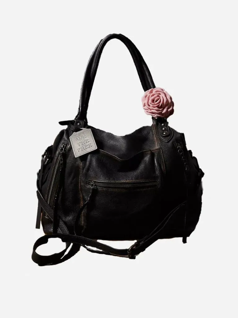 Free People Emerson Tote Bag, a slouchy distressed black bag with a pink rose charm