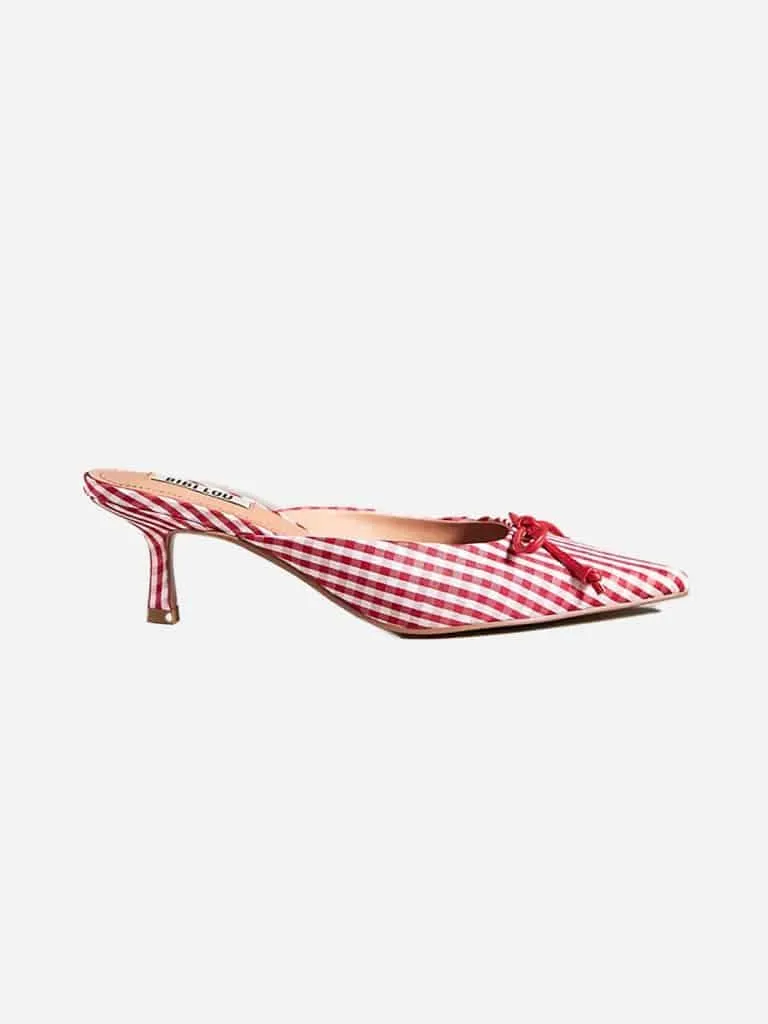 Red and white gingham Bibi Lou kitten heel mule with a red cord bow at the pointed toe