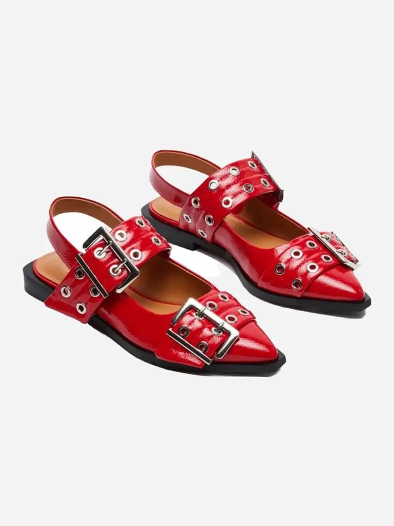Red patent pointed flats with silver buckle straps and slingbacks