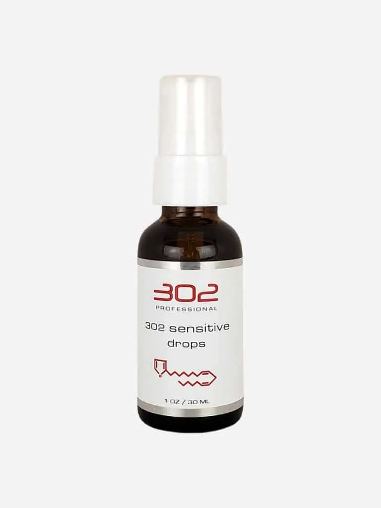 302 Professional 302 Sensitive Drops in a dark amber pump bottle