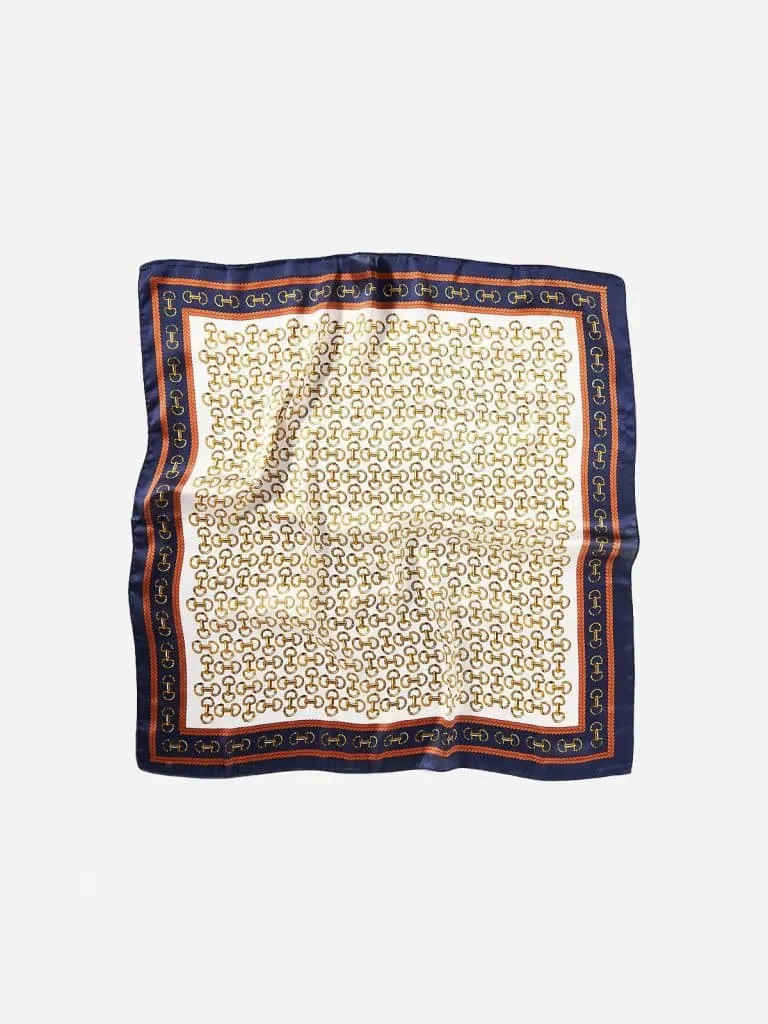 Navy, white and gold horsebit-print scarf with an orange rope border from Anthropologie