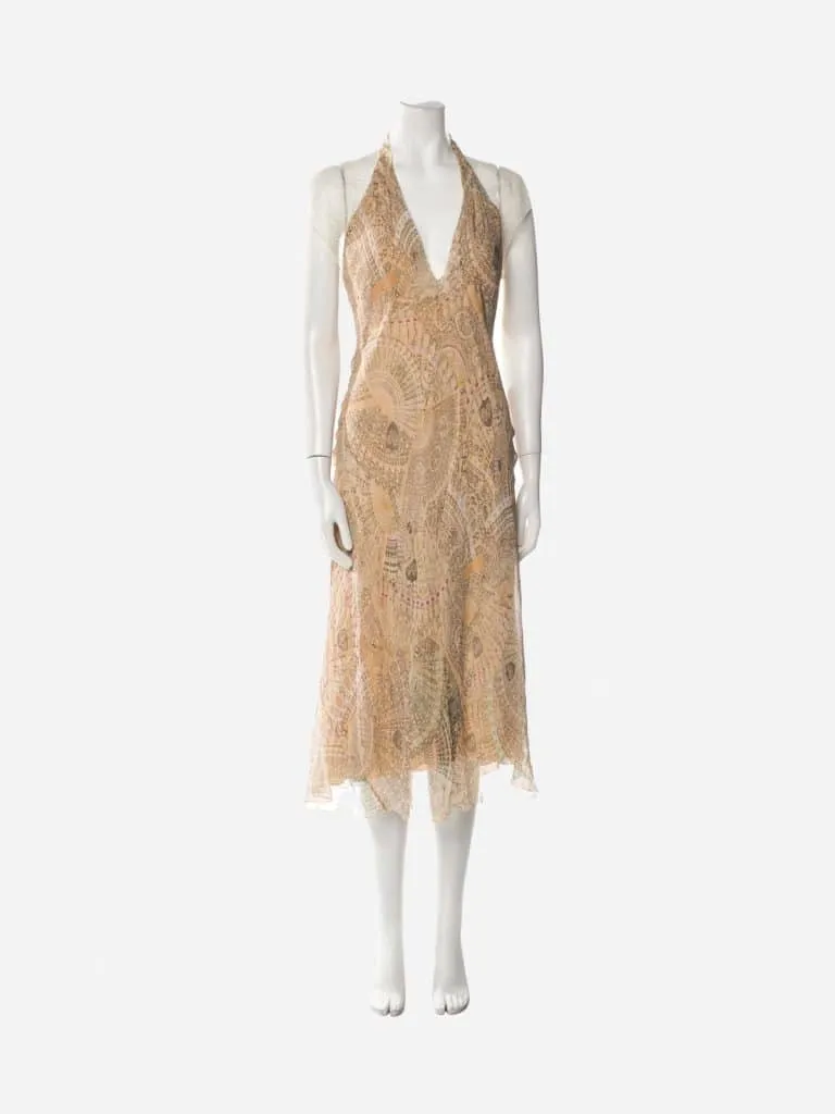Beige patterned Diane von Furstenberg silk halter midi dress on a white mannequin