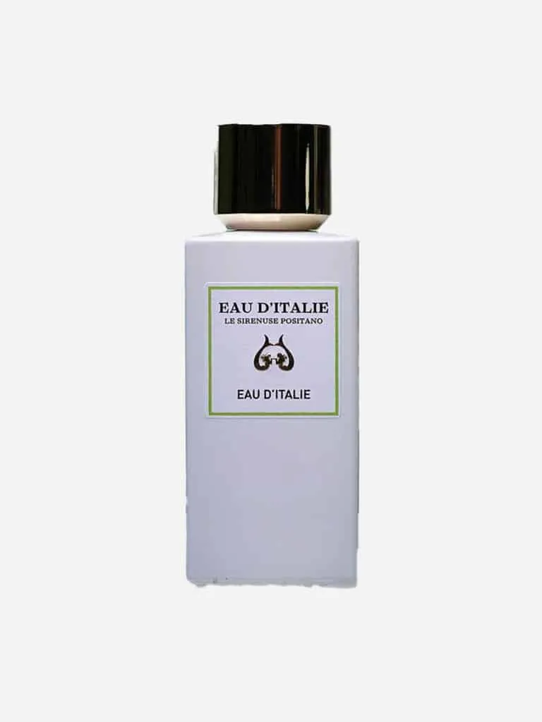 Opaque white Eau d'Italie perfume bottle with a gold cap and green-bordered label