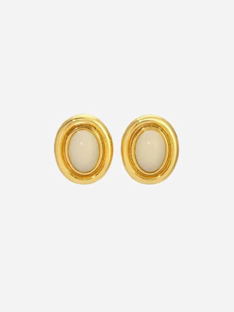 Pair of chunky gold oval stud earrings with cream cabochon centers from Heaven Mayhem
