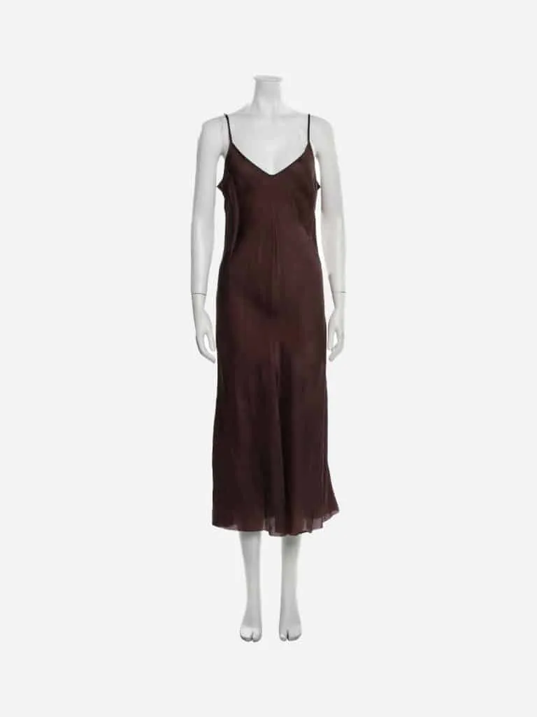 Chocolate brown silk midi slip dress with thin spaghetti straps on a white mannequin