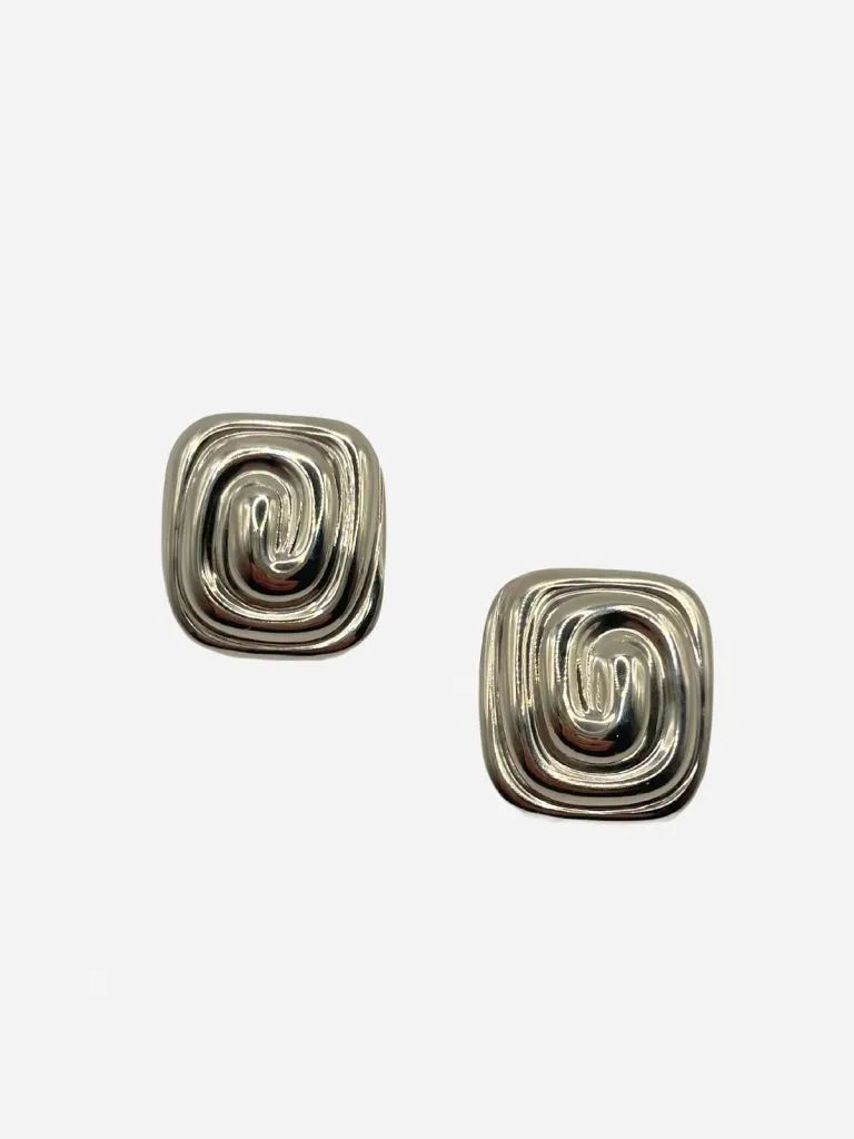 Lemon Lua Caia earrings, square silver studs with a raised swirl