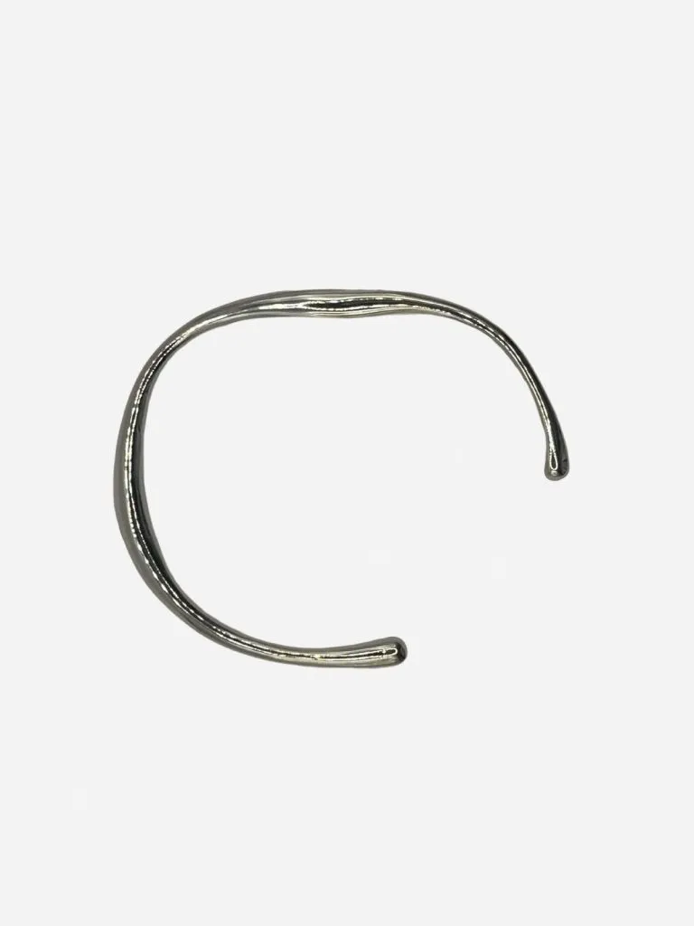 Lemon Lua Flowy Bangle, a thin open silver cuff